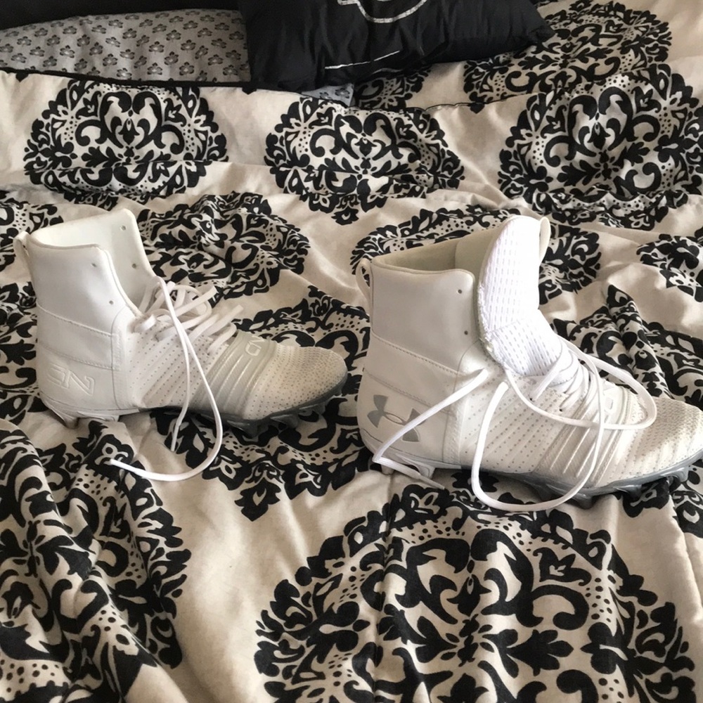 White youth football cleats